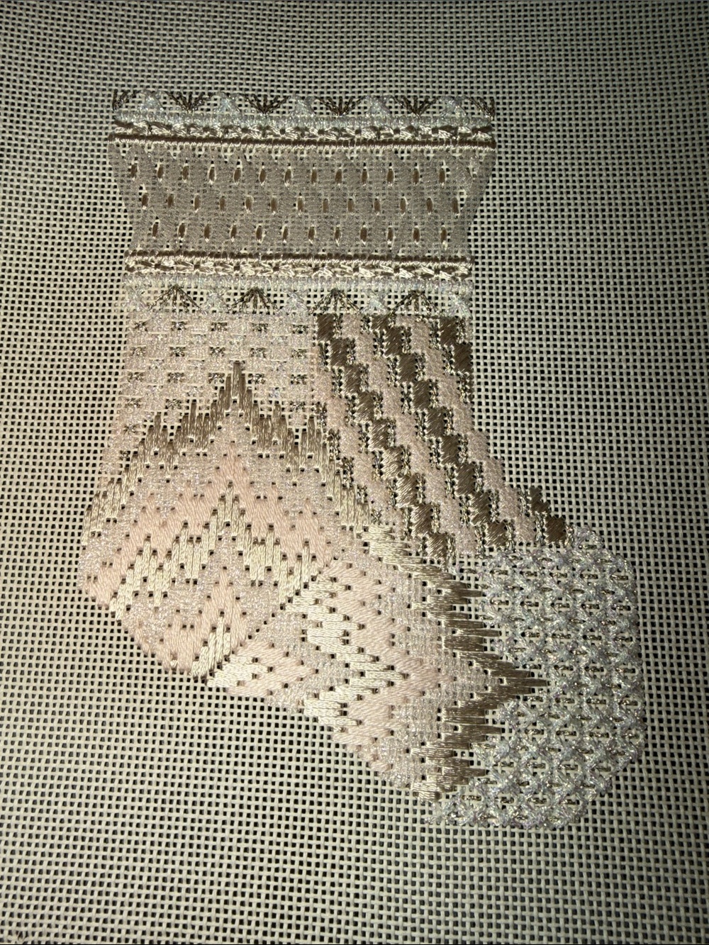 needlepoint project featuring intricate stocking metallic yarn  patterns, 🐈‍⬛